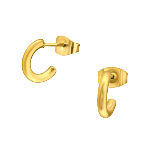 Kinderoorringen in halve hoepelvorm, gemaakt van chirurgisch staal.
